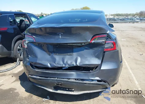 2023 Tesla Model Y из США, поврежденный, VIN 7SAYGDEE5PF834774